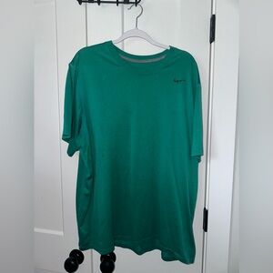 Very worn Nike Performance shirt